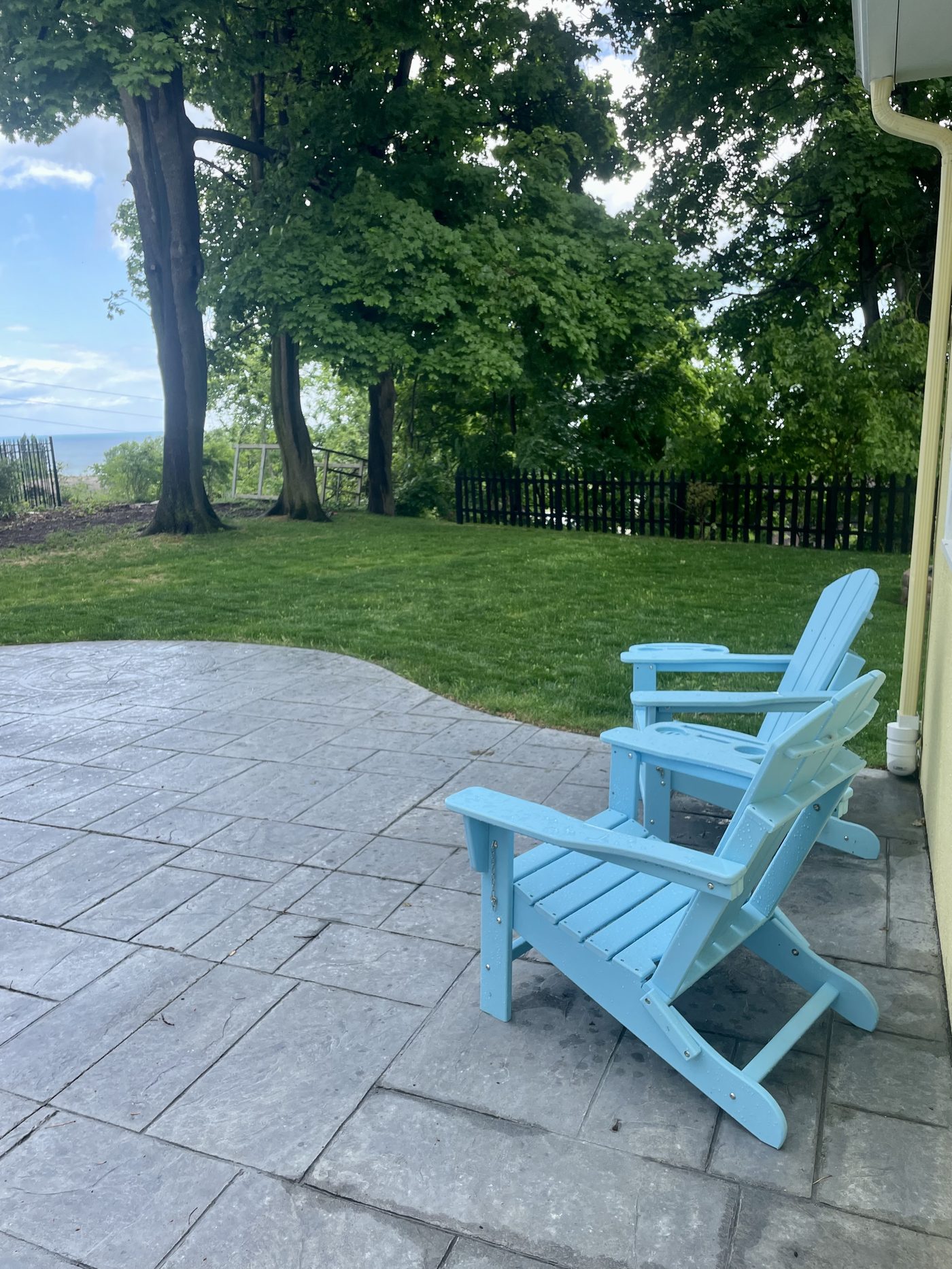 Patio with chairs and a view toward the lake